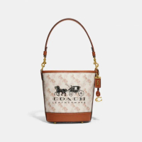 【COACH】蔻馳官方直營 DAKOTA馬車圖案印花 16號水桶包-B4/粉筆白色 高光琥珀色(CJ828)
