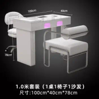 A manicure table and chair set with a second-generation vacuum cleaner and red light grill
