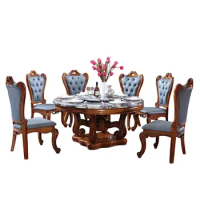 European-style solid wood marble dining table and chair combination round table Wujinmu dining table large luxury