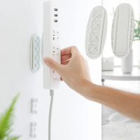 1pcs Wall-mounted Storage Socket Fixator Power Strip Holder Cable Rack Plug-in Fixer White Punch-free Home Office Cord Organizer