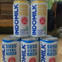 Indomilk susu streril (isi 5 kaleng)