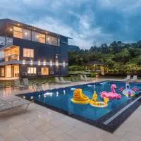 住宿 SaffronStays Sundowner by the Lake, Karjat - party-perfect pool villa with rain dance and cricket turf 卡爾賈特