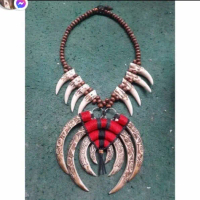 Kalung taring babi ukir etnik dayak