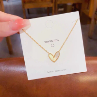 K135 Kalung TITANIUM Wanita Rantai Nori Kecil Bandul Love Keramik Putih Elegant Emas Perhiasan