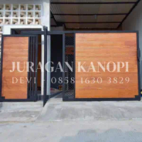 Pintu pagar minimalis / pagar grc motif kayu terpasang surabaya