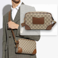 【GUCCI 古馳】821155 新款GG Emblem系列帆布手拿斜背中性款相機包(棕色)