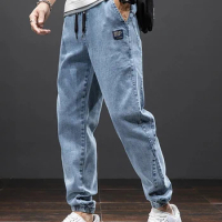 Spring And Autumn Men's Slim Quality Jeans Street Casual Jogging Pants Bundle Drawstring Harem Pants Fashion Trend Pants