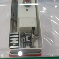 Sepatu lubang kancing mesin manual