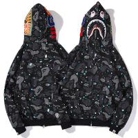 2023 MEN WOMEN BAPE แฟชั่นใหม่หลวมพิมพ์ดาวแขนยาวคลุมด้วยผ้าเสื้อกันหนาวที่ชื่นชอบ Bape × MCM เสื้อแจ