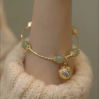 Original design natural Hetian jade bell Bracelet for women Light luxury Advanced feeling Ancient gold craft bangles jewelry