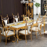 Natural marble dining table European classical dining table chair combination villa hollow-carved flower design