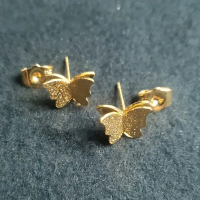 anting kenot titanium Perempuan