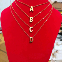kalung liontin huruf titanium