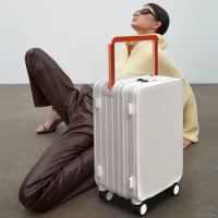 Carry-on suitcases with wide pull bars and carry-on wheels with large capacity luggage