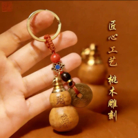 Original Putuo wooden hollow pumpkin keychain, lucky keychain pendant, a decorative item that attrac