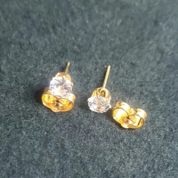 anting kenot titanium Perempuan