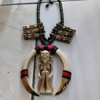 Kalung taring etnik khas dayak kalimantan handmade