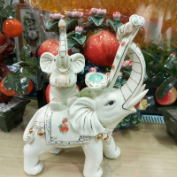 gajah gendong anak pajangan keramik