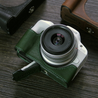 適用佳能r50相機包保護套配件R100相機套微單便攜女斜挎小眾真皮