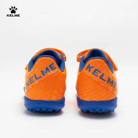 KELME Kids TF Soccer Shoes Professional Sports Training Velcro Fastener Football Shoes Light Streamlined Skeleton Shoes