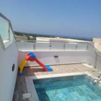 住宿 Appartement avec piscine vue sur mer Raʼs al Jabal