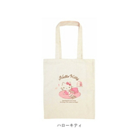 小禮堂 Hello Kitty 直式帆布側背袋 (米鋼琴款)