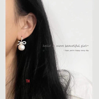 Bông tai BT145 Lâm Trang - Bông tai trai nơ hoa bằng bạc của BNG