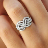 Huitan 2023 New Woman Ring Twist Infinite Shape Crystal Cubic Zirconia Rings Exquisite Female Wedding Bands Fashion Jewelry Bulk