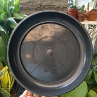 tatakan pot hitam 60-70cm/alas pot