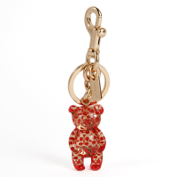 COACH 經典滿版C LOGO透明樹酯泰迪熊造型雙扣環鑰匙圈-紅色