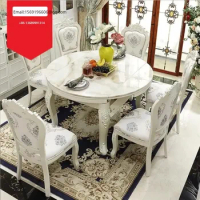 European-style solid wood round dining table and chair combination set simple retractable marble creative dining table