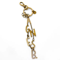 【agnes b.】復古風 質感金屬字串鑰匙圈吊飾(復古銅色)
