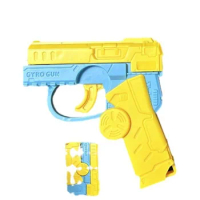 Popular mini decompression spin back kick gun 2-in-1 fidget spinner radish gun toy boy toy