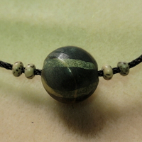 邦提克珠Pumtek Beads/地珠-木化石材質的鑲蝕珠子