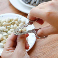 Alat Pengupas Pembuka Kulit Kuaci Stainless Steel Pemecah Kacang dan Biji Bijian