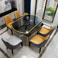 Modern luxury dining table and chair combination telescopic folding circular stretching