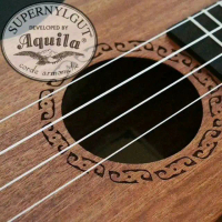 senar ukulele Aquila pelangi clear Asli